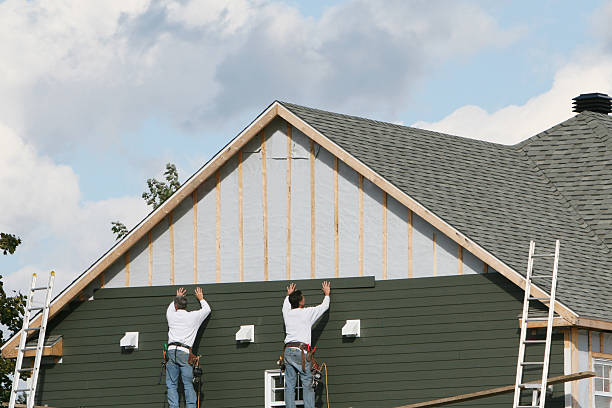 Professional Siding technician working in Dunn, NC
